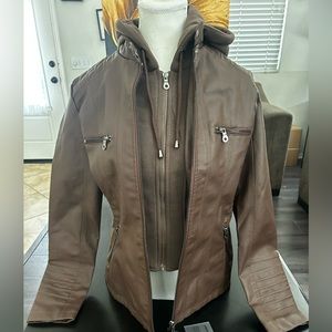 Jacket Fabric 65% Polyurethane 35% Polyester and Lining is 100% Polyester